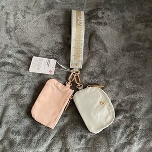 lululemon athletica light, gray, and soft pink Dual Pouch Wristlet new with tags